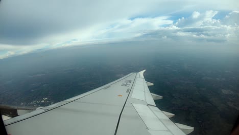 view from the aircraft window to the runway