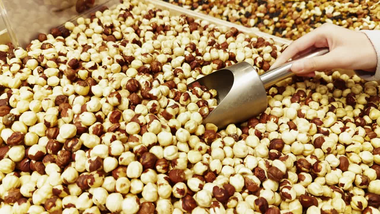 Scooping Hazelnuts in Bulk