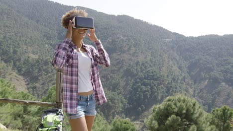 female backpacker in vr glasses