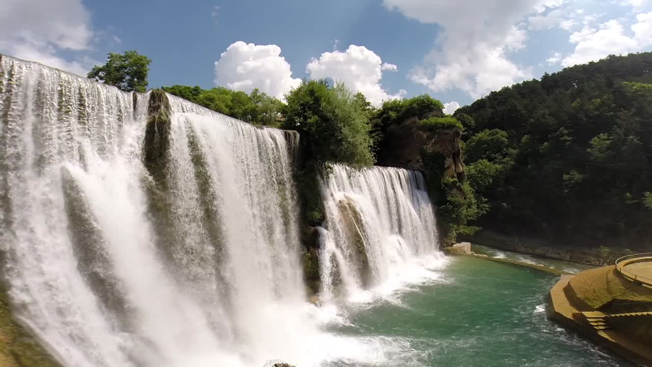 View of a waterfall with pure nature