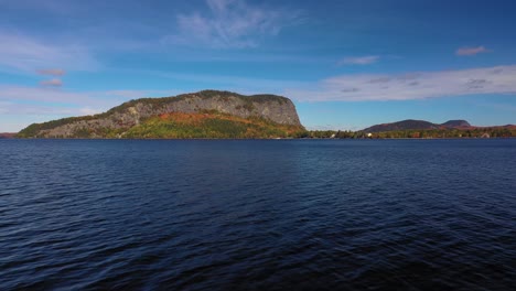 aerial footage flying low over moosehead lake towards kineo mountain