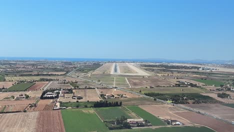 an immersive aerial view from the cockpit of a jet airplane in the final approach to palma de mallorca airport in a sunny summer morning