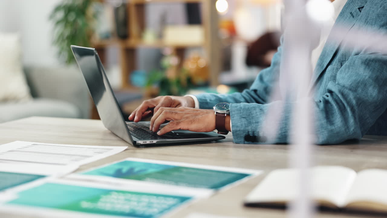 Businessman working on a laptop at his desk