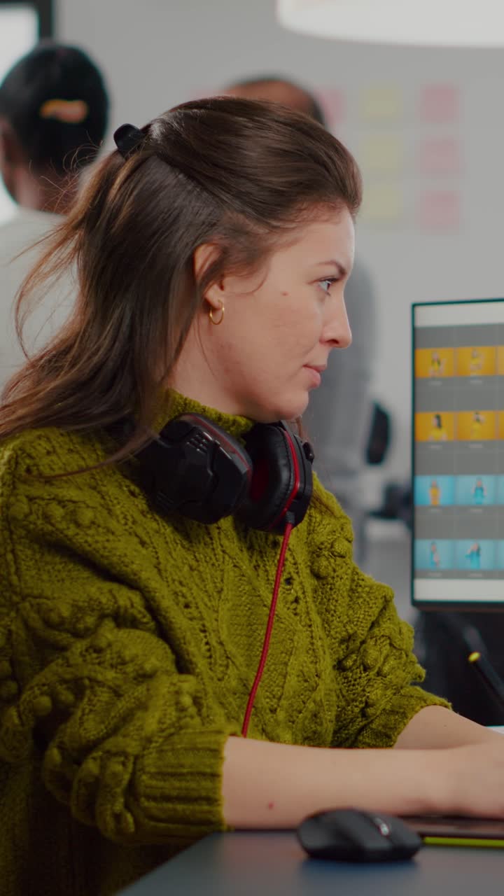 Vertical video Professional woman photo retoucher working with digital assets