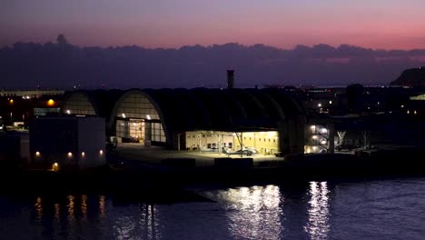 Helicopter-in-a-hanger-at-San-Diego-naval-base-during-sunset