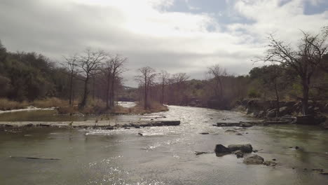 aerial of river in central texas hill country