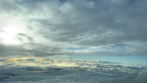 Aerial-view,-pilot-point-of-view,-from-a-jet-cockpit-during-cruise-level-with-a-cold-winter-sky