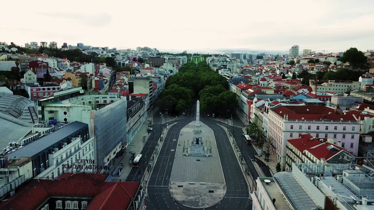 Lockdown. Aerial footage shows landmarks and tourist hotspots in Lisbon completely empty, with only a few cars on the streets. Restauradores Square