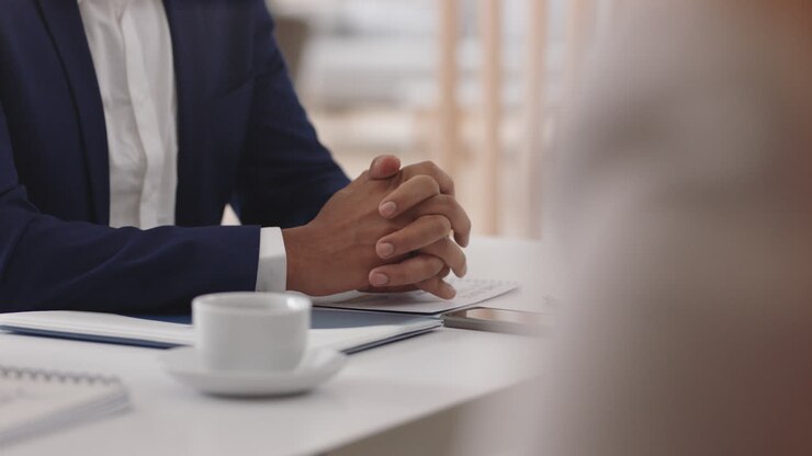 stressed businessman hands in meeting feeling anxiety for corporate decision