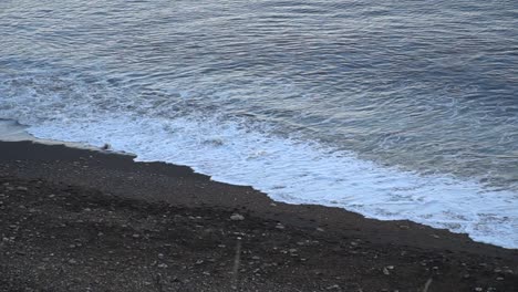 ocean waves crashing onto a stoney beach in north east england, seaham, sunderland, durham