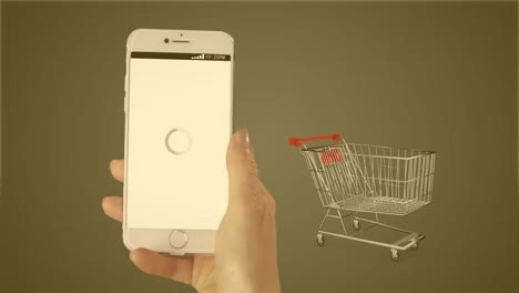 animación de la mano con el teléfono inteligente sobre el carrito de compras