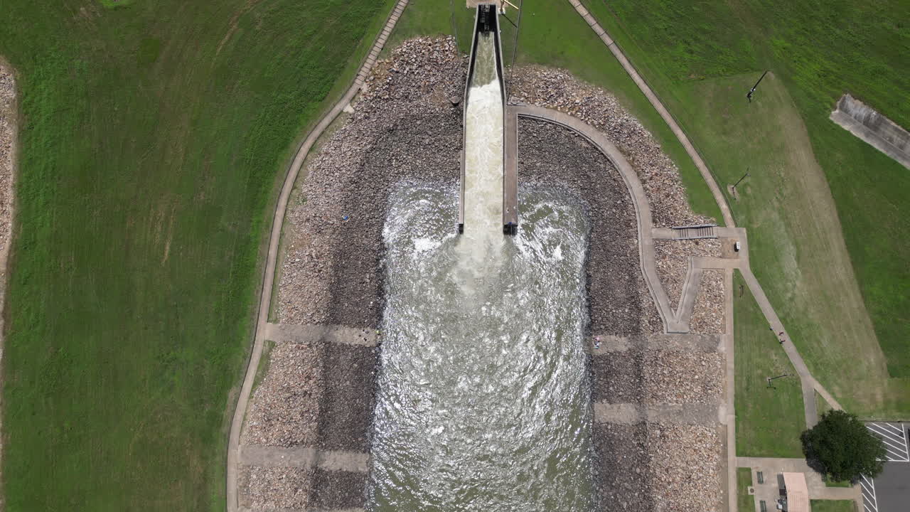 Drone shot looking down at a lakes spillway while it is open. Shot in 4k 60fps in 10 bit 422