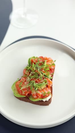 salmon avocado toast on plate