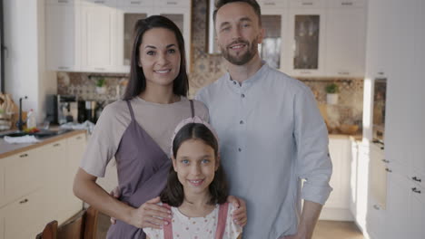 happy family portrait in kitchen