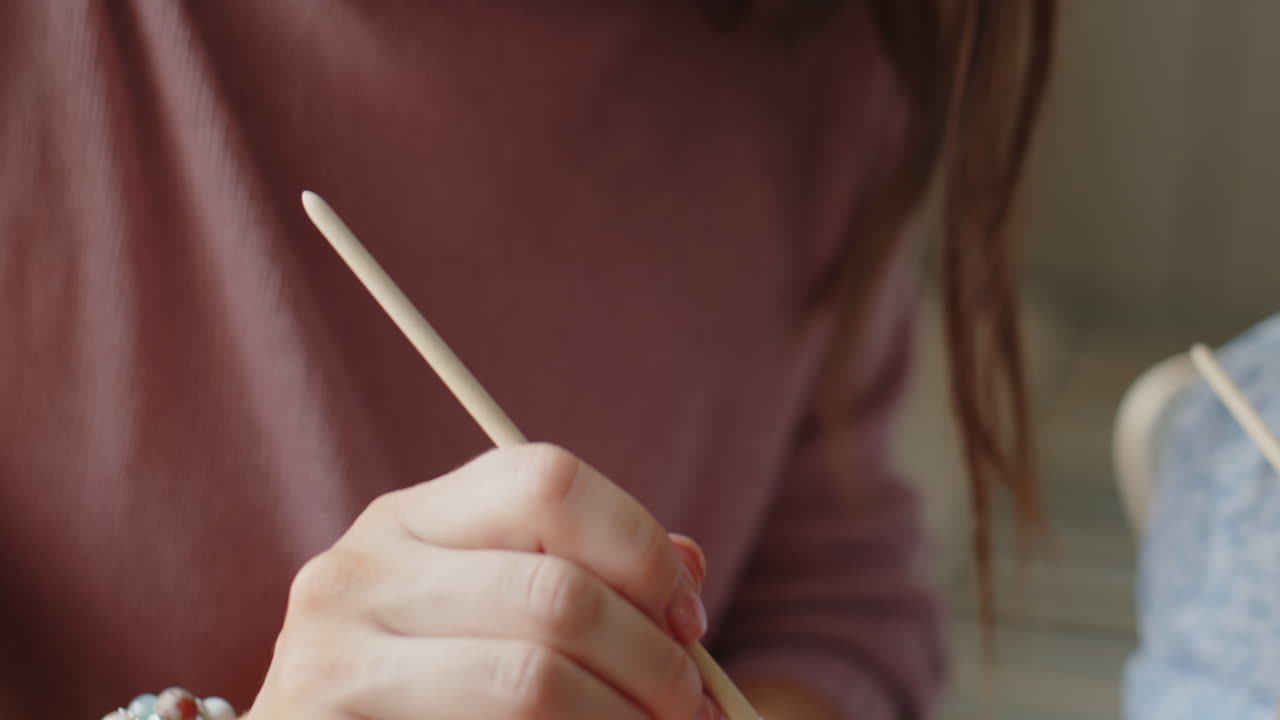 Mom and Daughter Using Paint on Easter Eggs