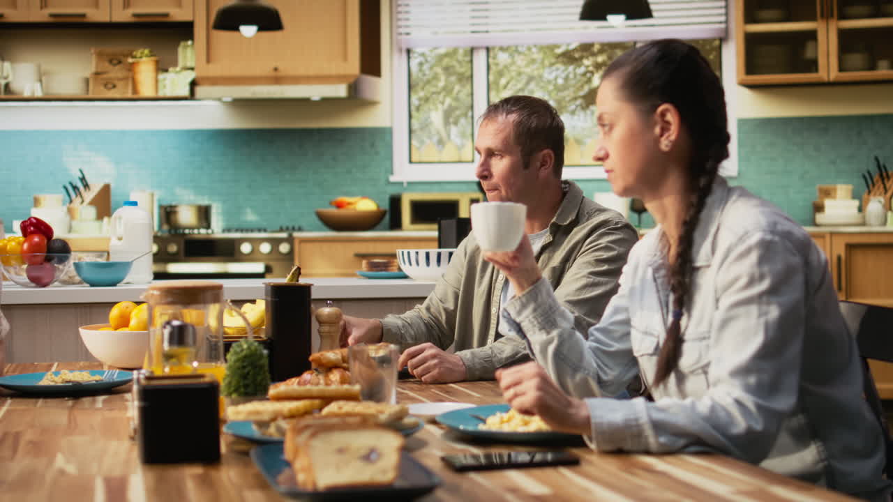 Stressed dad feeling disconnected and preoccupied ignoring daughter
