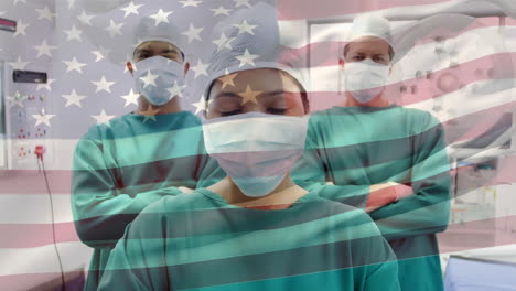 animation of flag of usa waving over surgeons in operating theatre