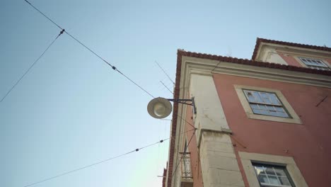lisbon old street forbidden traffic sign panning to street old lamp