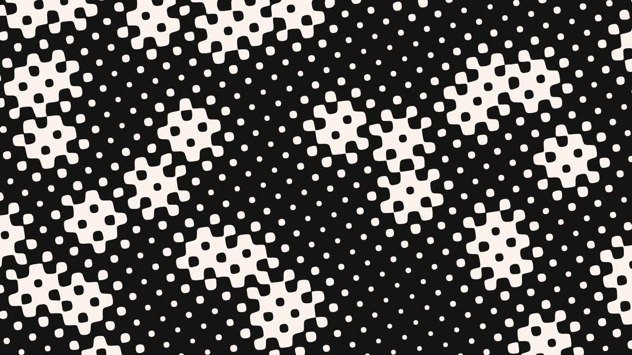 Bold and timeless close-up of a black and white polka dot pattern