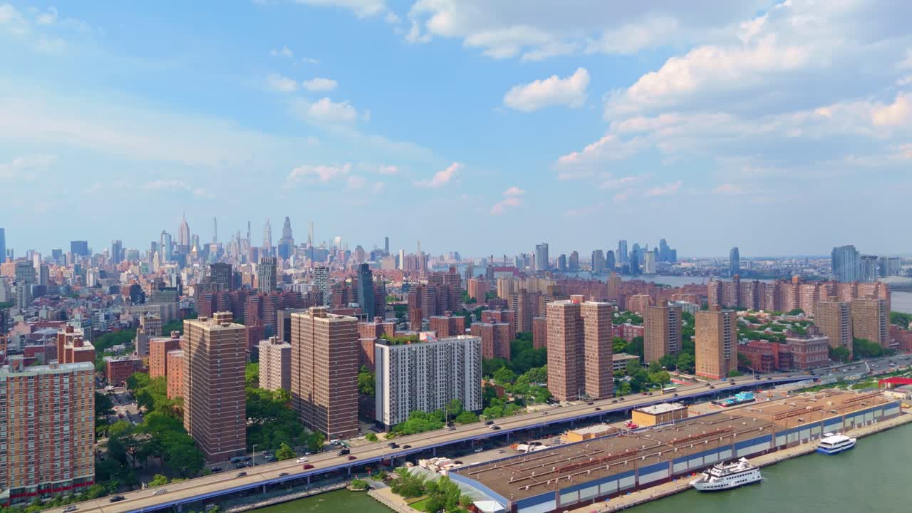Drone view of Lower East Side Manhattan skyline in New York from over East River