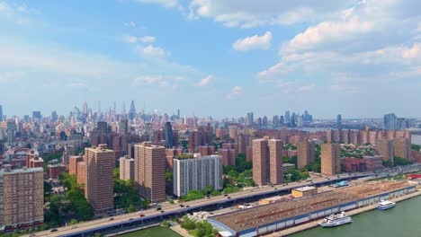 Drone view of Lower East Side Manhattan skyline in New York from over East River
