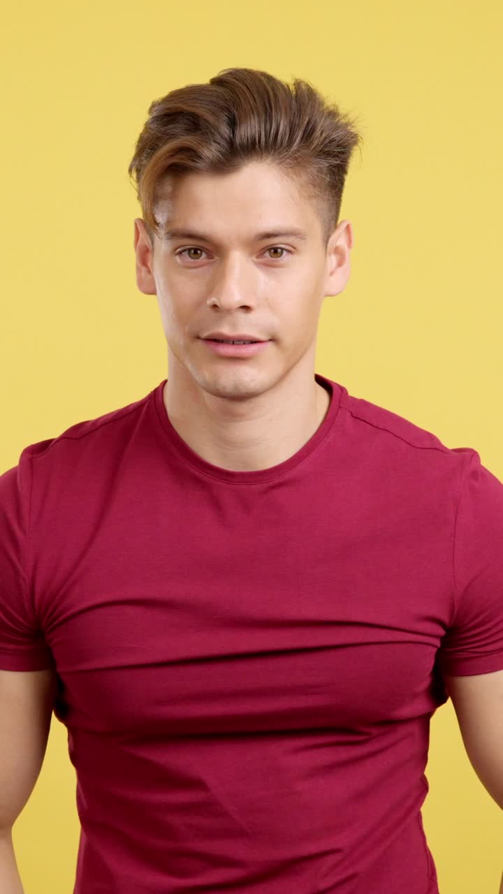 Young man showing expressions of shock and surprise