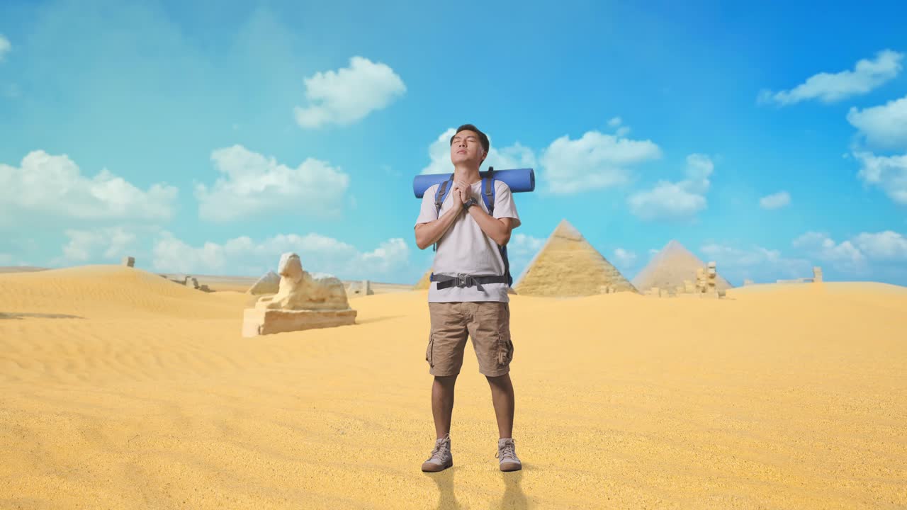 Tourist Praying in the Egyptian Desert