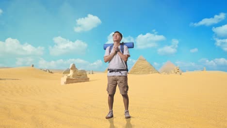 tourist praying in the egyptian desert