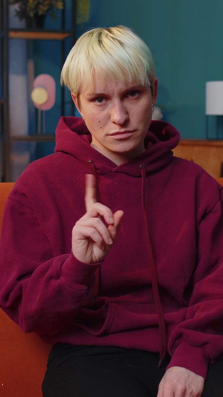 Displeased upset woman reacting to unpleasant awful idea dismiss bad idea wave hand shake head no