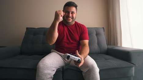 guy excited with victory on video games