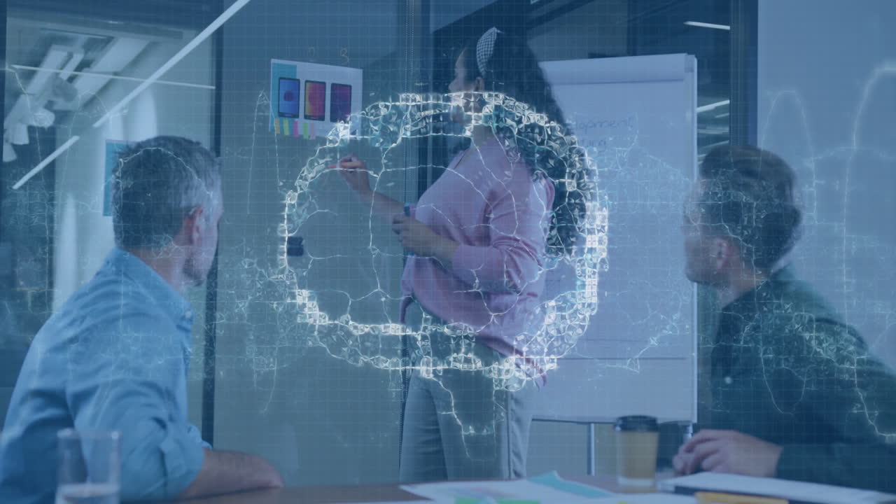 Business meeting with digital network animation overlaying people discussing ideas
