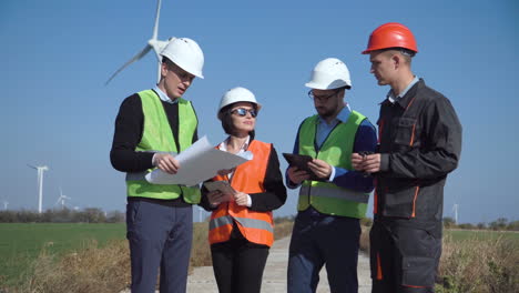 wind turbine engineers discussing plans