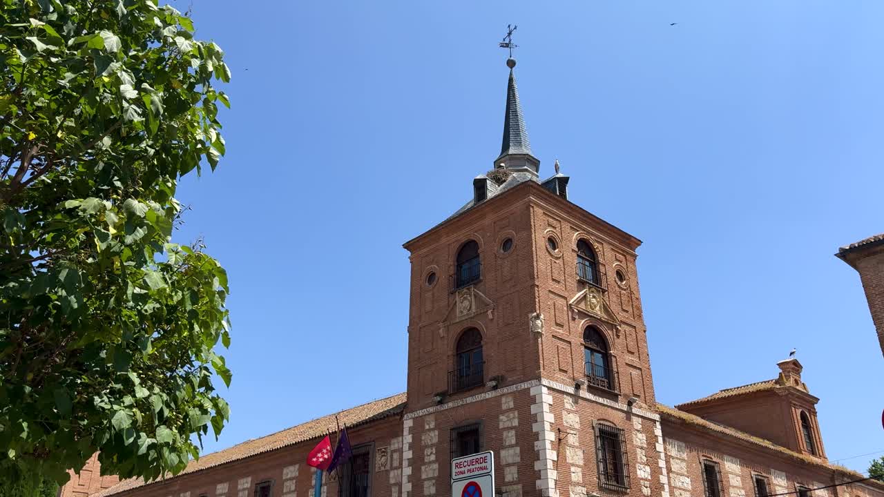 Historic building in sunny Alcala de Henares, Spain, with clear sky