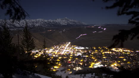 time lapse showing the town of jackson wyoming nightlife from high above the town