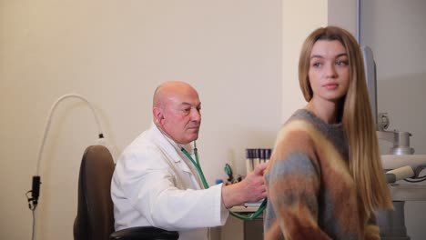 doctor examining a patient
