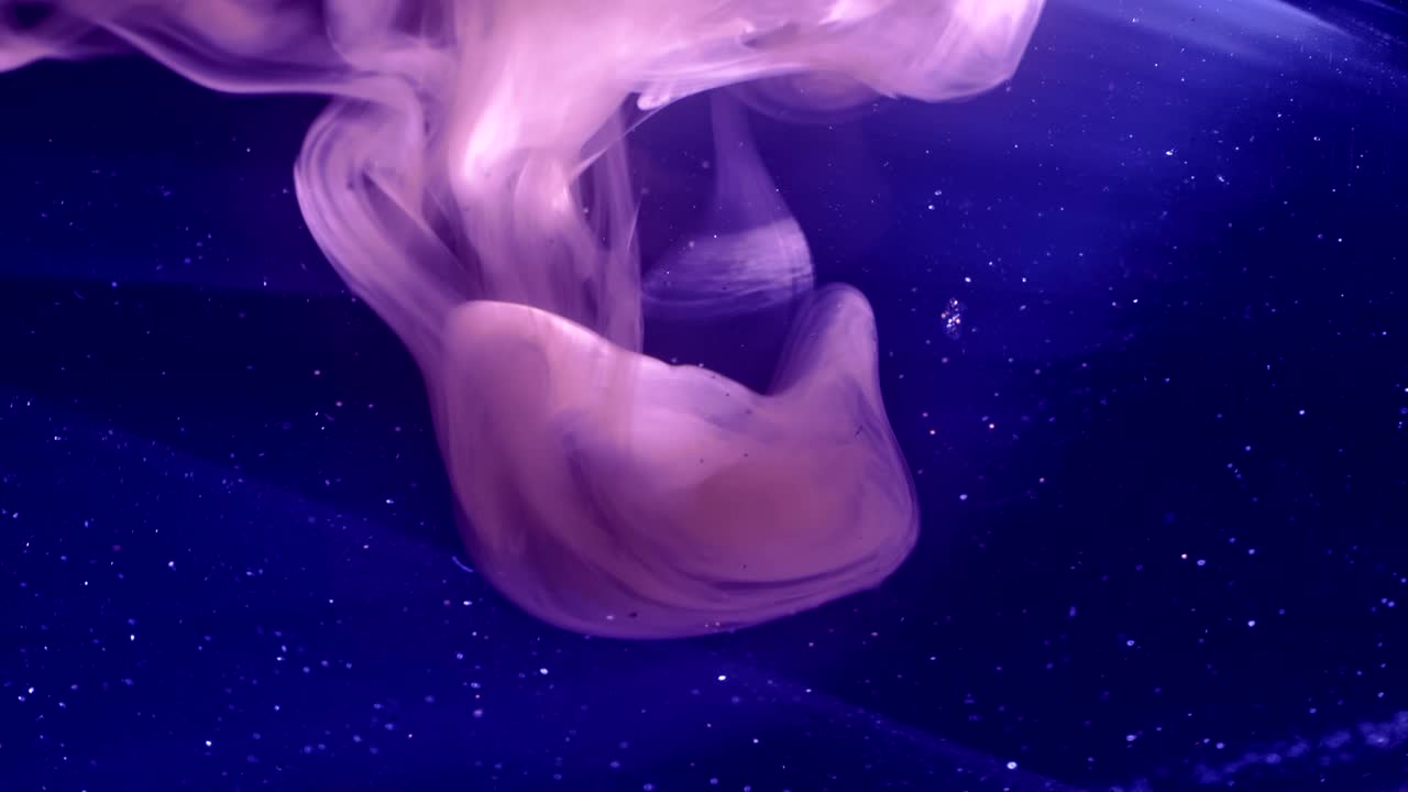 Elegant and delightful real liquid visual effect of paint inside water.