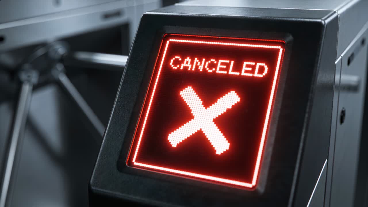 Showing LED panel on fare gate displaying CANCELED, receiving cancel signal with tripod arms