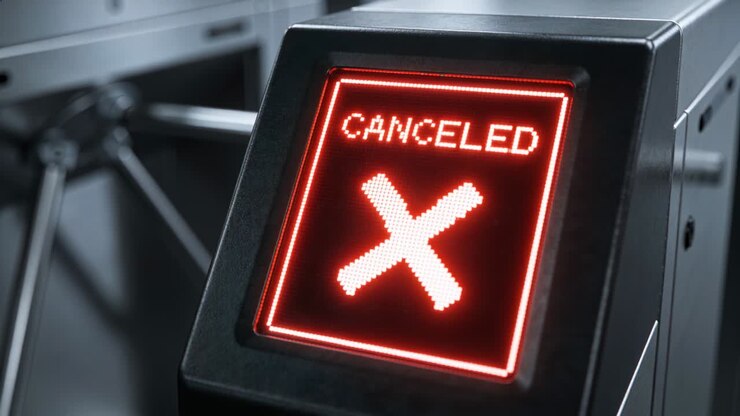 Showing LED panel on fare gate displaying CANCELED, receiving cancel signal with tripod arms