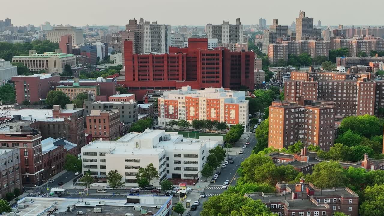 Cityscape view of New York City showing buildings and greenery