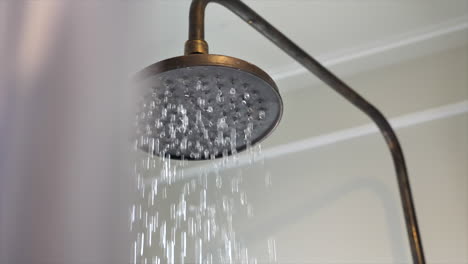 close-up of water running from a shower head