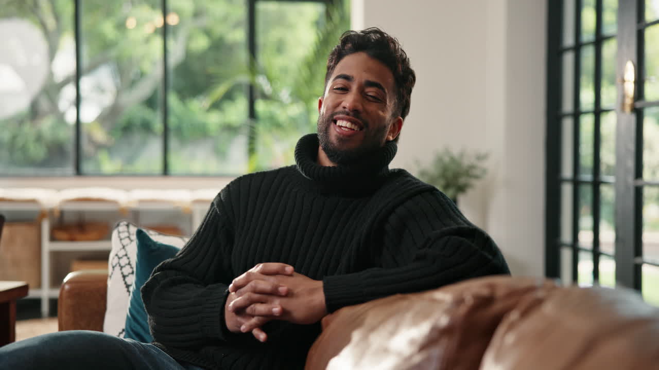 Portrait of a Smiling Man in Living Room