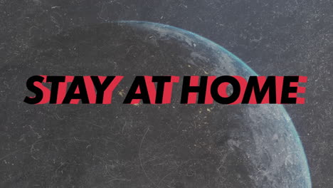 animation of covid 19 stay at home text over globe