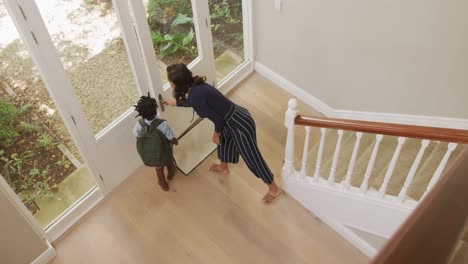 mother saying goodbye to her son