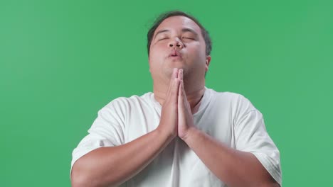man praying and celebrating