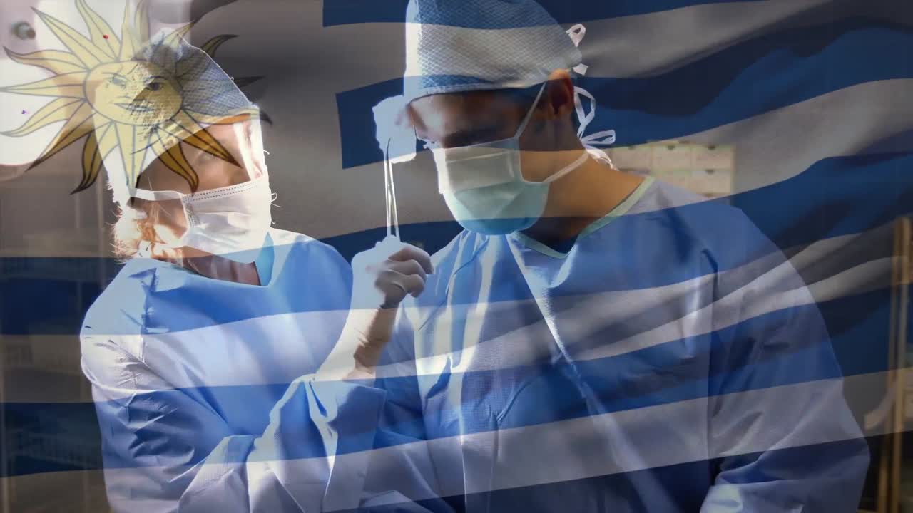 animación de la bandera de uruguay ondeando sobre los cirujanos en la sala de operaciones