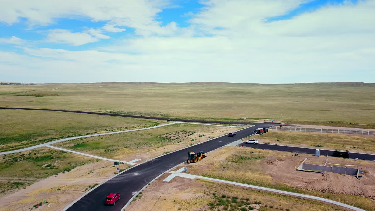 Fly over new intersection in middle of New Subdivision Construction.mo