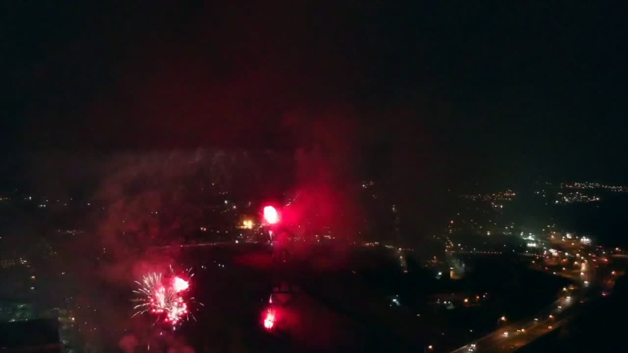 Fireworks display showing a firework in the shape of a heart