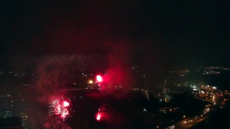 fireworks display showing a firework in the shape of a heart