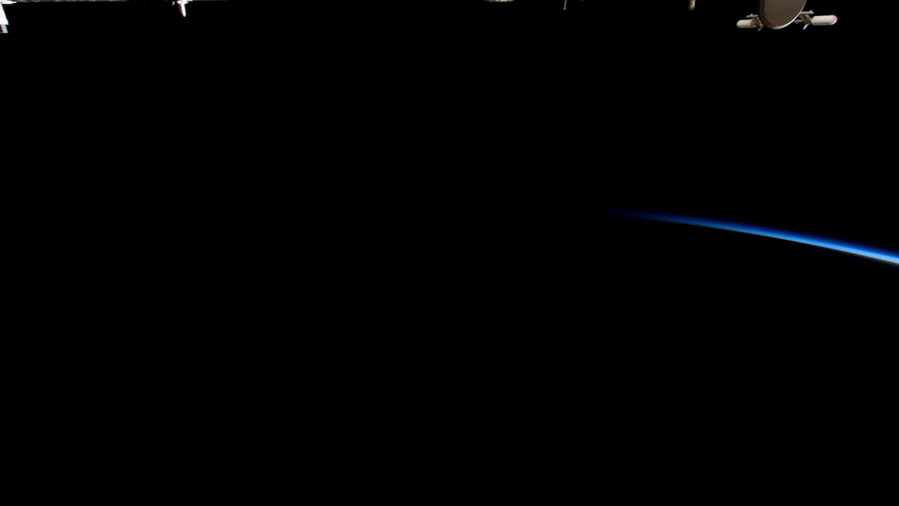 The International Space Station Flies Over The Earth As Day Turns To Night 1