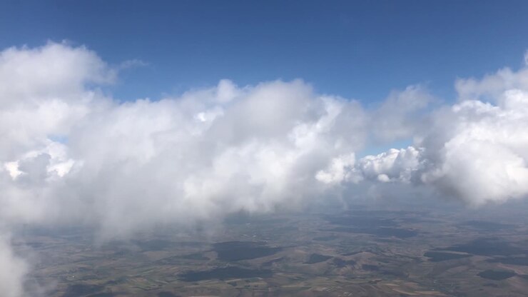 Aerial View of Clouds and Landscape